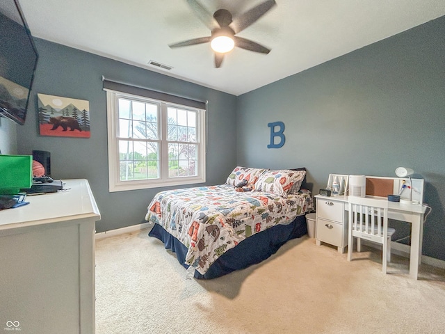 8798 Surrey Dr, Pendleton, IN 46064 - bedroom featuring light colored carpet, an office area, baseboards, and a ceiling fan