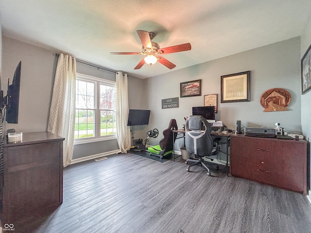 8798 Surrey Dr, Pendleton, IN 46064 - office space featuring wood finished floors, a ceiling fan, and baseboards