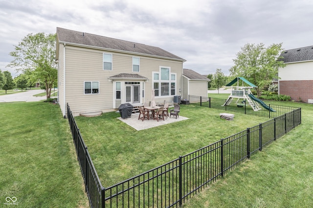 1476 Anon Ct, Greenwood, IN 46143 - rear view of house with a patio, a playground, and cooling unit