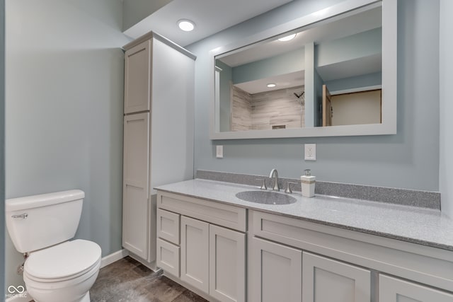 1476 Anon Ct, Greenwood, IN 46143 - full bath with vanity, toilet, baseboards, recessed lighting, and a shower