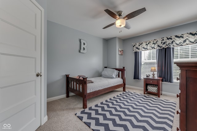 1476 Anon Ct, Greenwood, IN 46143 - bedroom with carpet flooring, baseboards, and ceiling fan