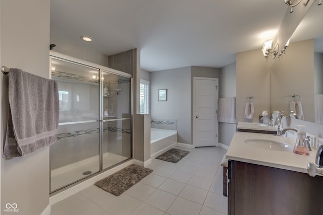 1476 Anon Ct, Greenwood, IN 46143 - bathroom with a garden tub, double vanity, tile patterned floors, a shower stall, and baseboards
