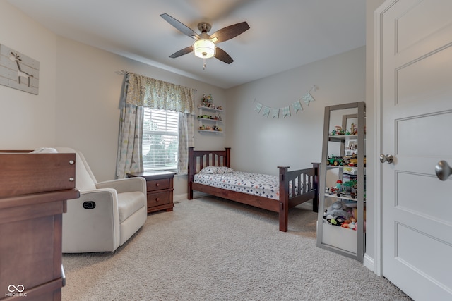 1476 Anon Ct, Greenwood, IN 46143 - bedroom featuring light colored carpet, baseboards, and ceiling fan