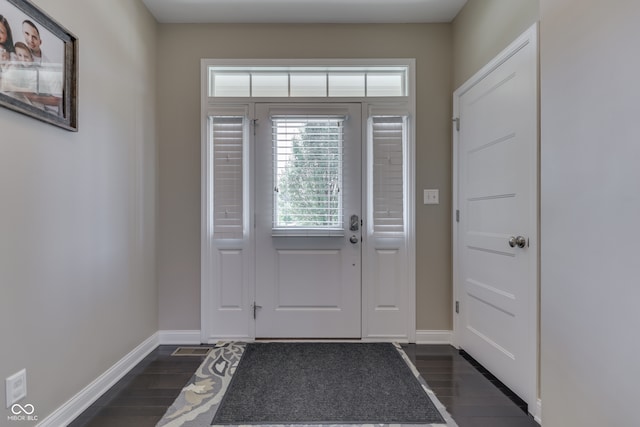 1476 Anon Ct, Greenwood, IN 46143 - foyer entrance featuring dark wood-style floors and baseboards