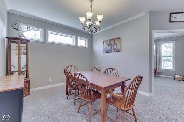 1476 Anon Ct, Greenwood, IN 46143 - dining space featuring a chandelier, light carpet, healthy amount of natural light, ornamental molding, and baseboards