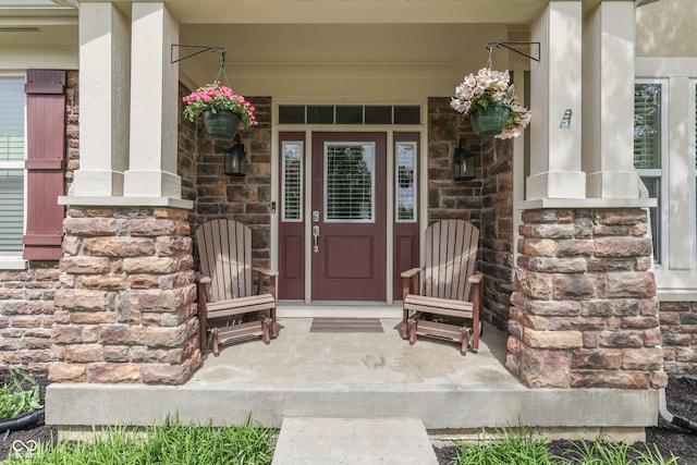 1476 Anon Ct, Greenwood, IN 46143 - doorway to property with a porch and stone siding