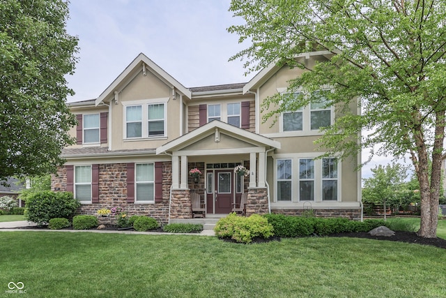 1476 Anon Ct, Greenwood, IN 46143 - craftsman house featuring stucco siding, stone siding, and a front yard