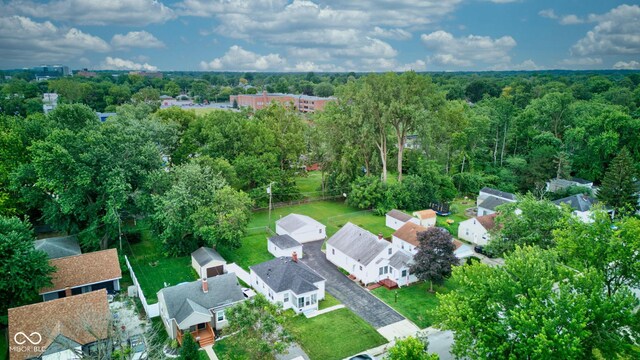 1517 Wallace Ave, Indianapolis, IN 46201 - drone / aerial view featuring a wooded view and a residential view