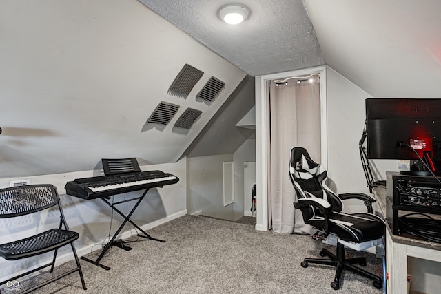 office space with carpet flooring and lofted ceiling