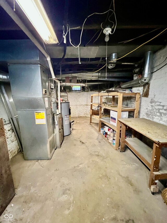unfinished below grade area with water heater and heating unit