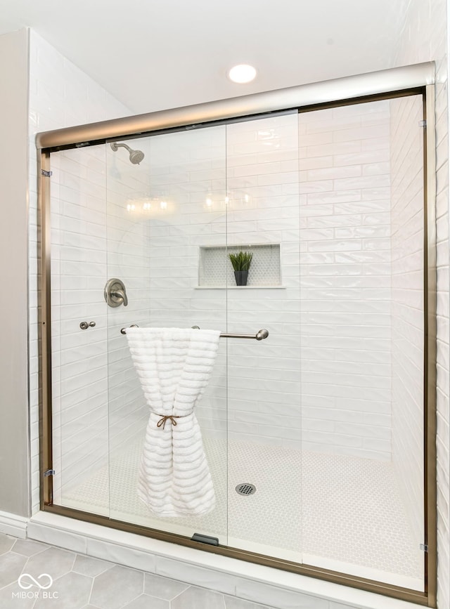 7118 Mikesell Dr, Indianapolis, IN 46260 - bathroom with a stall shower, tile patterned flooring, and recessed lighting