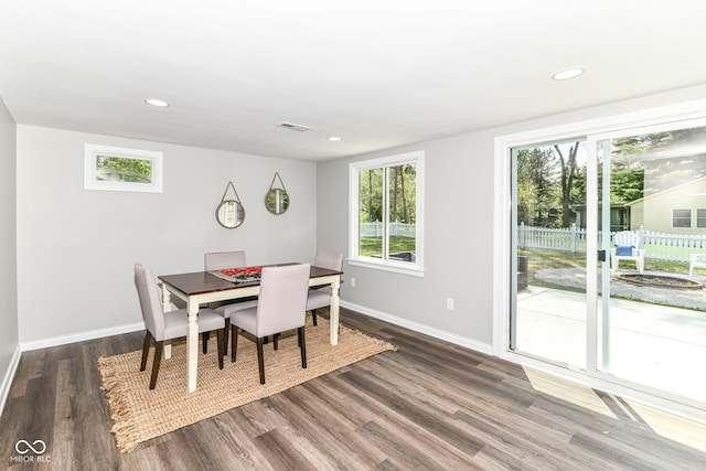 7118 Mikesell Dr, Indianapolis, IN 46260 - dining space with wood finished floors, baseboards, and recessed lighting