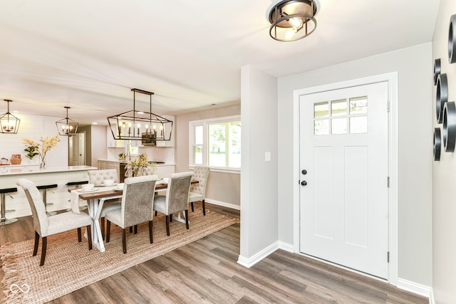 7118 Mikesell Dr, Indianapolis, IN 46260 - foyer with wood finished floors and baseboards
