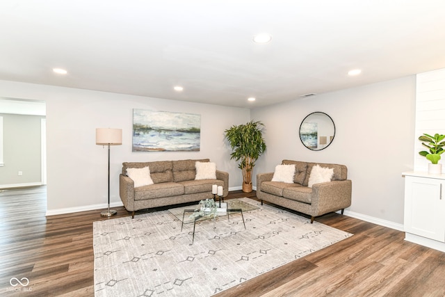 7118 Mikesell Dr, Indianapolis, IN 46260 - living room with wood finished floors, recessed lighting, and baseboards