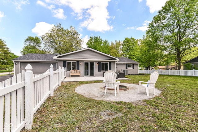 7118 Mikesell Dr, Indianapolis, IN 46260 - back of property with a patio and roof with shingles