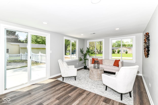 7118 Mikesell Dr, Indianapolis, IN 46260 - living room featuring wood finished floors, baseboards, and recessed lighting