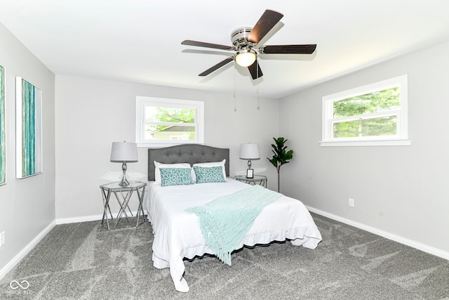 7118 Mikesell Dr, Indianapolis, IN 46260 - bedroom featuring carpet flooring, baseboards, and a ceiling fan