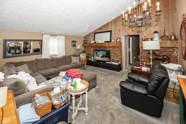400-416 S Pennsylvania St, Greenfield, IN 46140 - carpeted living area featuring vaulted ceiling, a textured ceiling, a chandelier, wooden walls, and a brick fireplace
