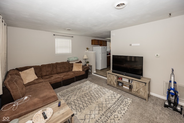 400-416 S Pennsylvania St, Greenfield, IN 46140 - carpeted living room featuring baseboards