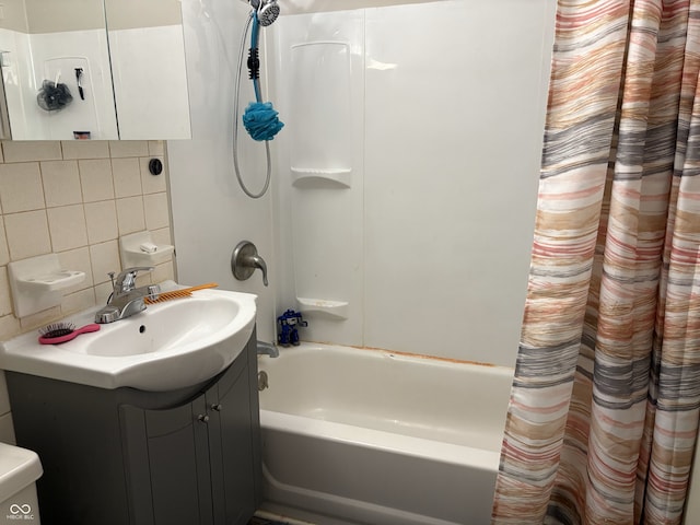 400-416 S Pennsylvania St, Greenfield, IN 46140 - bathroom with backsplash, shower / bath combo with shower curtain, and vanity