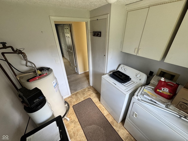 575 Mill Spgs, Coatesville, IN 46121 - washroom with washing machine and clothes dryer, water heater, cabinet space, and a textured ceiling