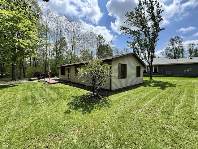 575 Mill Spgs, Coatesville, IN 46121 - view of home's exterior with a lawn