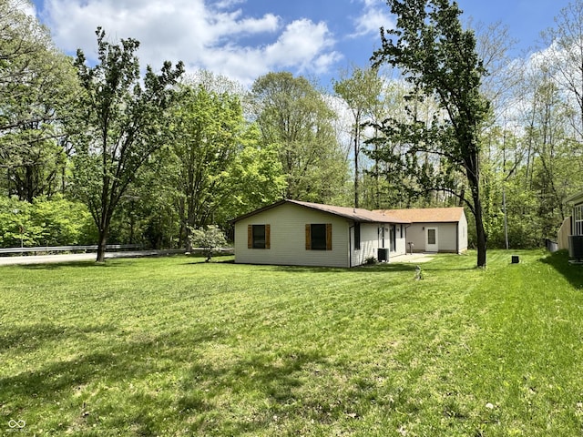 575 Mill Spgs, Coatesville, IN 46121 - view of green lawn with view of scattered trees