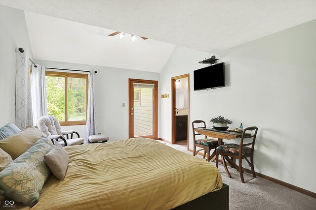 11471 Clarkston Rd, Zionsville, IN 46077 - bedroom featuring light colored carpet, vaulted ceiling, baseboards, a ceiling fan, and ensuite bath