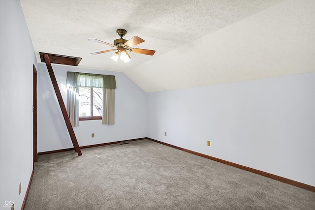 11471 Clarkston Rd, Zionsville, IN 46077 - bonus room with carpet floors, ceiling fan, vaulted ceiling, a textured ceiling, and baseboards
