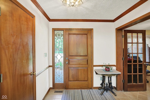 11471 Clarkston Rd, Zionsville, IN 46077 - entryway with light tile patterned flooring, a textured ceiling, baseboards, and crown molding