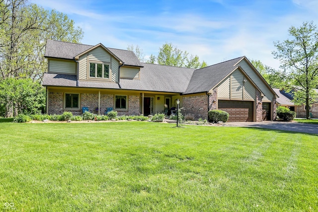 11471 Clarkston Rd, Zionsville, IN 46077 - view of front of property featuring driveway, a garage, a front yard, and brick siding