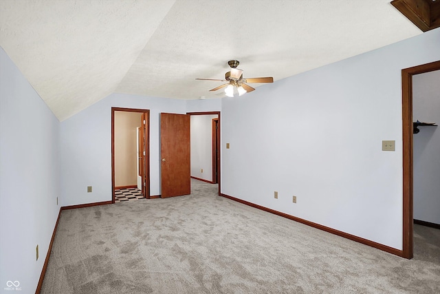 11471 Clarkston Rd, Zionsville, IN 46077 - additional living space with carpet floors, ceiling fan, baseboards, and vaulted ceiling