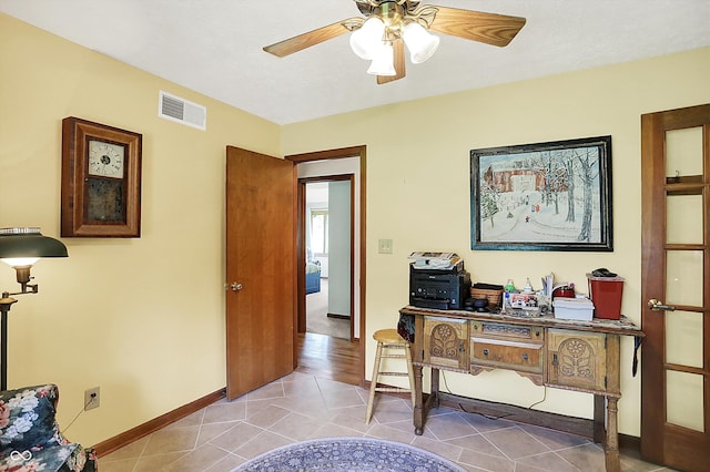 11471 Clarkston Rd, Zionsville, IN 46077 - home office featuring a ceiling fan, baseboards, and tile patterned floors