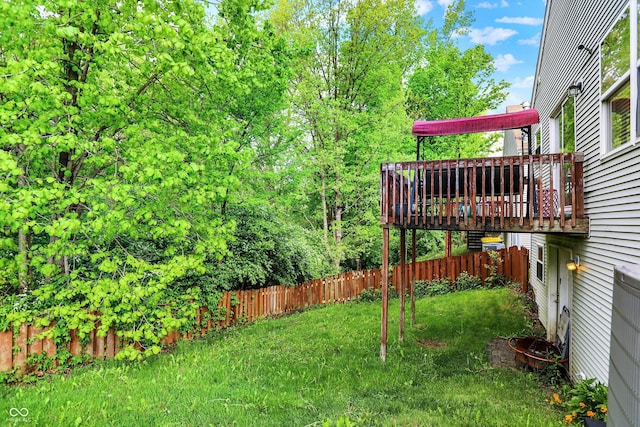 view of yard with a deck