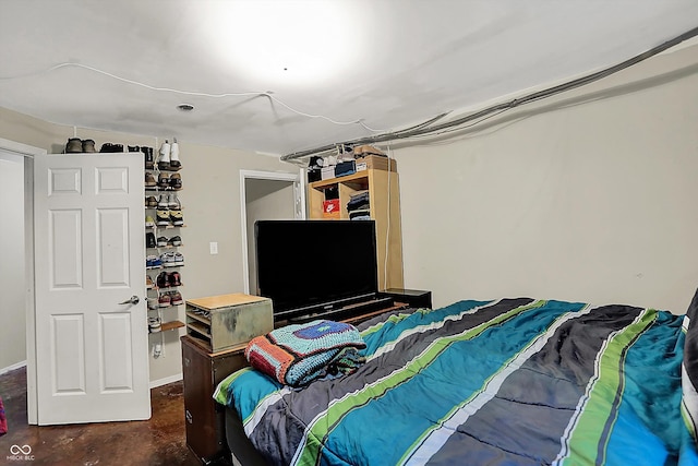 bedroom with concrete floors