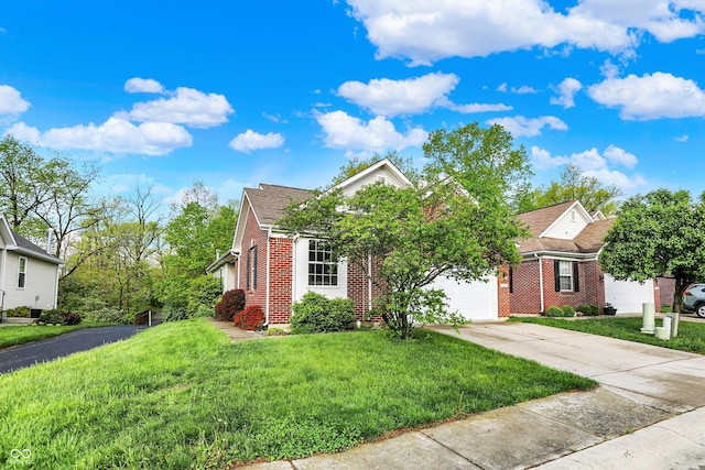 view of front facade with concrete driveway, an attached garage, brick siding, and a front yard