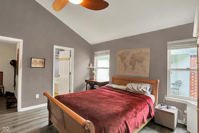 bedroom with wood finished floors, baseboards, connected bathroom, high vaulted ceiling, and ceiling fan