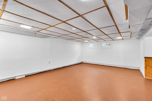 below grade area featuring recessed lighting and baseboards