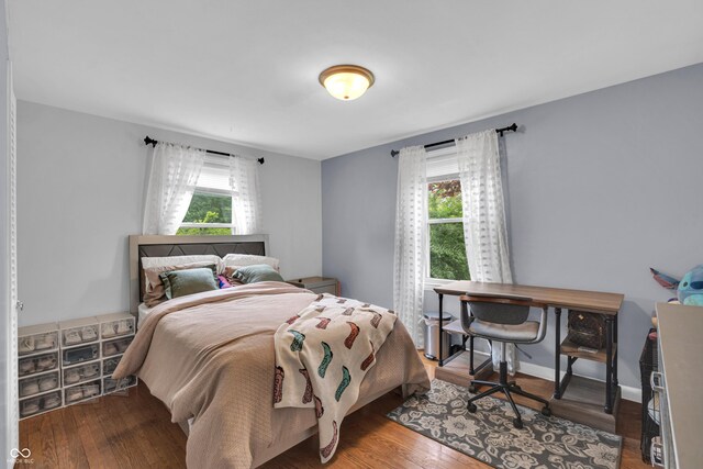 bedroom featuring wood finished floors