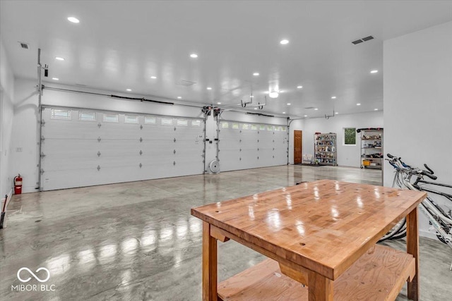6465 Lawrence Dr, Indianapolis, IN 46226 - garage featuring recessed lighting