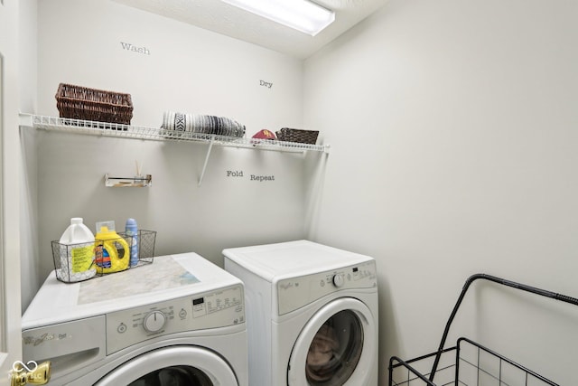 7045 Gavin Dr, Indianapolis, IN 46217 - clothes washing area with washing machine and dryer