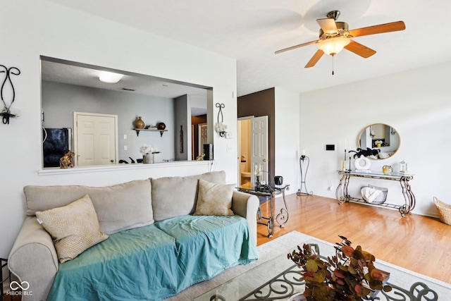 7045 Gavin Dr, Indianapolis, IN 46217 - living room featuring wood finished floors and ceiling fan