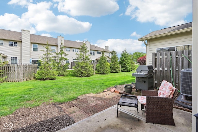 7045 Gavin Dr, Indianapolis, IN 46217 - view of patio with grilling area, central AC, and a residential view