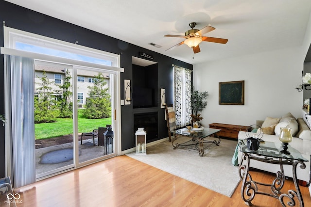 7045 Gavin Dr, Indianapolis, IN 46217 - living room featuring a ceiling fan and wood finished floors