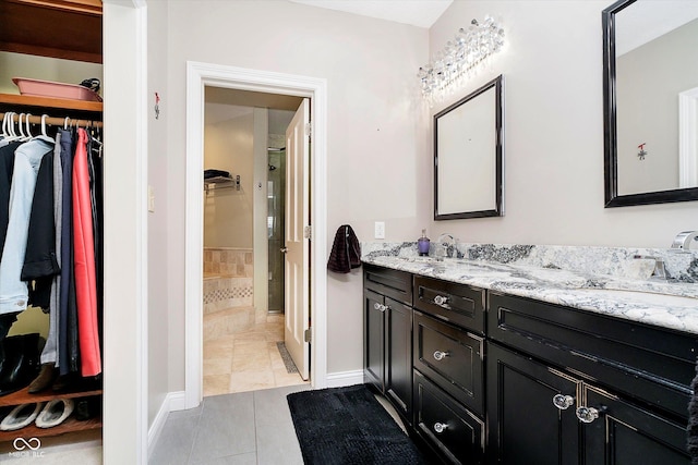 11319 Shoreview Ln, Indianapolis, IN 46236 - full bath featuring a walk in closet, tile patterned flooring, double vanity, and baseboards