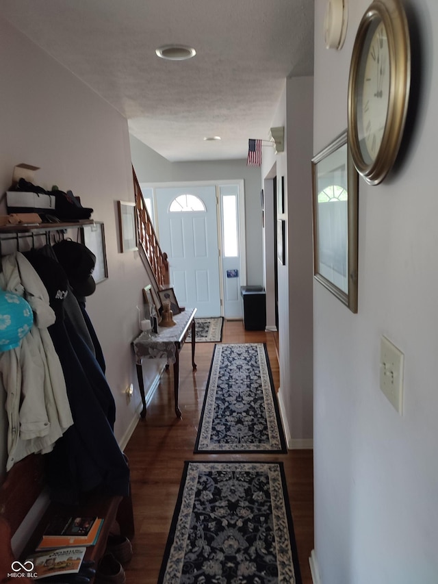 4719 Arabian Run, Indianapolis, IN 46228 - entryway with baseboards, wood finished floors, a textured ceiling, stairway, and recessed lighting