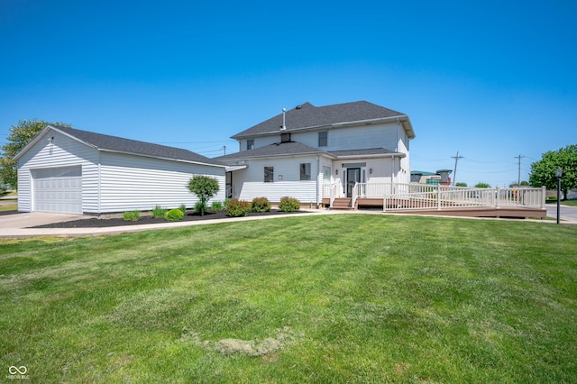 view of front facade with a garage, a wooden deck, a front lawn, and a shingled roof