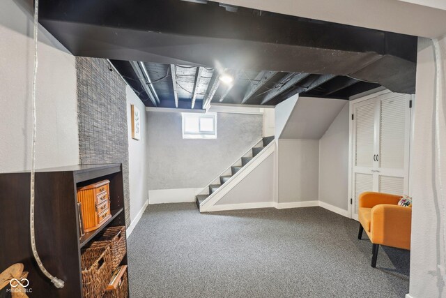 4245 Guilford Ave, Indianapolis, IN 46205 - basement featuring carpet, stairway, and baseboards