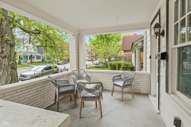 1728 N Delaware St, Indianapolis, IN 46202 - view of patio / terrace featuring a residential view and covered porch