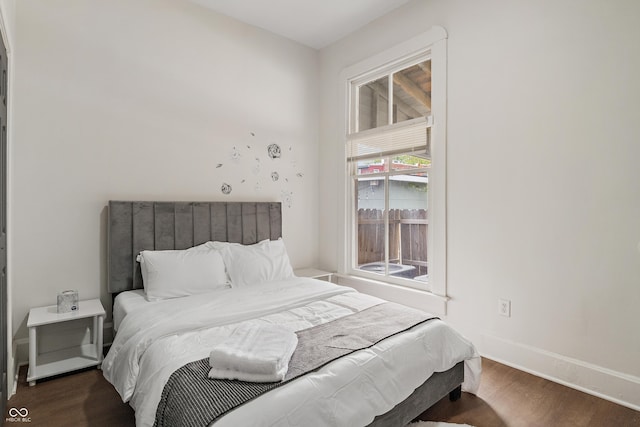 1728 N Delaware St, Indianapolis, IN 46202 - bedroom with wood finished floors and baseboards